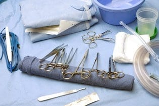 Minimally Invasive Back Surgery Procedure at AICA Orthopedics with Scissors and Knives