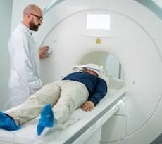 man getting an mri atlanta done with AICA doctor